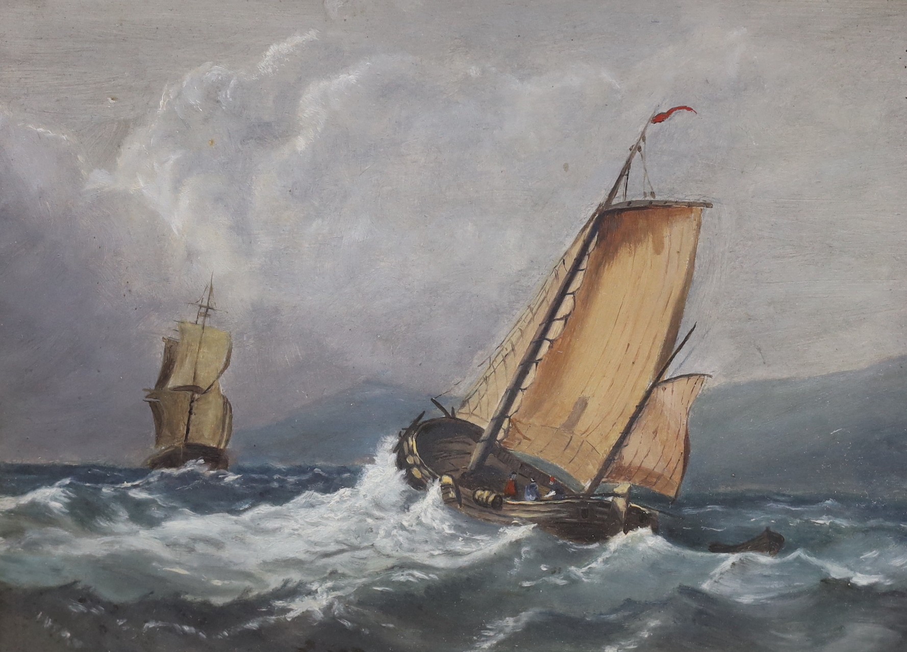 19th century English school, oil on board, Fishing boat at sea, 21 x 29cm and a watercolour of beached fishing boats, 15 x 22cm